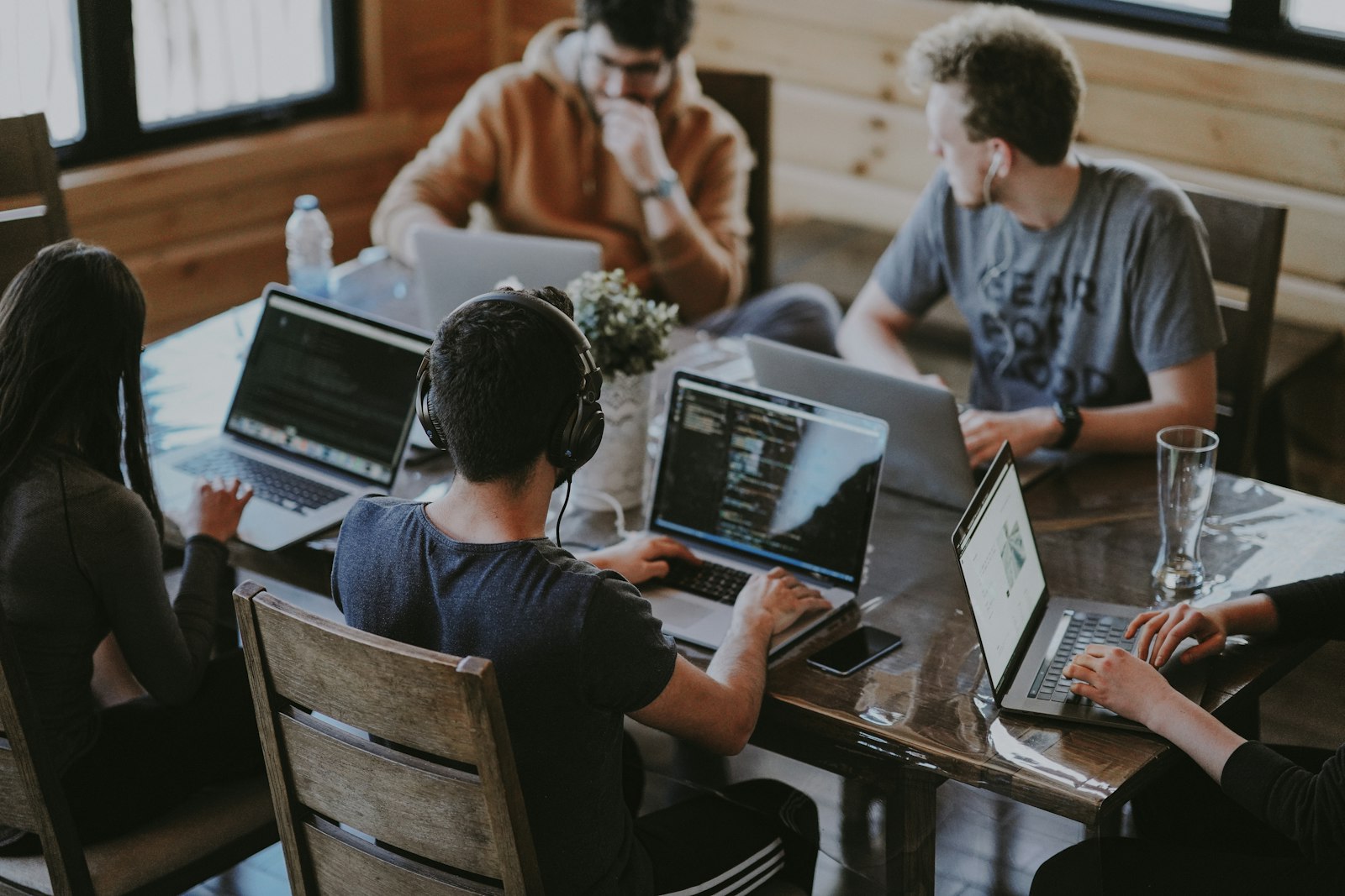 Sidstack team collaborating around a table